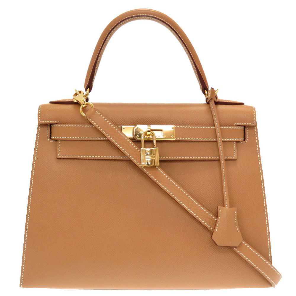 新品同様 エルメス ケリー28 外縫い クシュベル ナチュラル ゴールド金具 V金具 新金具 □D刻印 ハンドバッグ バッグ 茶 0011 【中古】 HERMES