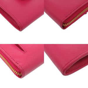 美品 プラダ ラウンドファスナー リボン 1M0506 レザー サフィアーノレザー ペオニア 1211 長財布【中古】PRADA