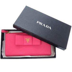 美品 プラダ ラウンドファスナー リボン 1M0506 レザー サフィアーノレザー ペオニア 1211 長財布【中古】PRADA