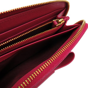 美品 プラダ ラウンドファスナー リボン 1M0506 レザー サフィアーノレザー ペオニア 1211 長財布【中古】PRADA