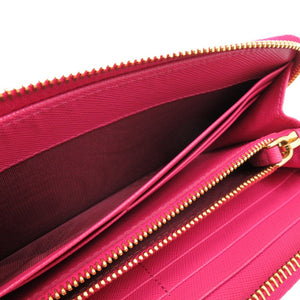 美品 プラダ ラウンドファスナー リボン 1M0506 レザー サフィアーノレザー ペオニア 1211 長財布【中古】PRADA