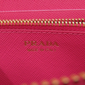 美品 プラダ ラウンドファスナー リボン 1M0506 レザー サフィアーノレザー ペオニア 1211 長財布【中古】PRADA