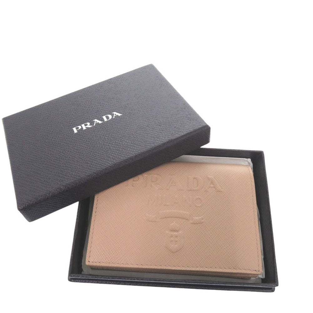 美品 プラダ サフィアーノレザー ピンク 1MV204 二つ折り財布 0104【中古】PRADA