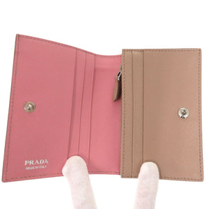 美品 プラダ サフィアーノレザー ピンク 1MV204 二つ折り財布 0104【中古】PRADA