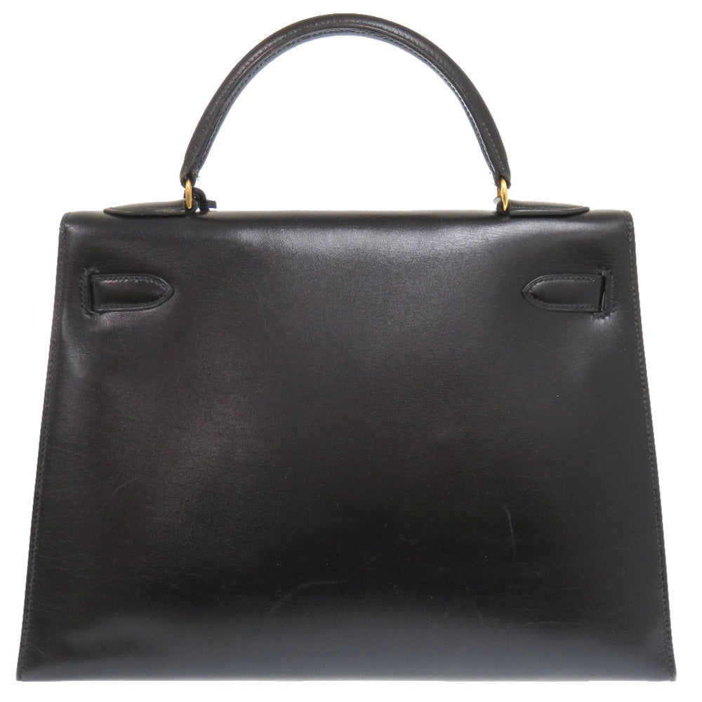 エルメス ケリー32 外縫い ボックスカーフ ブラック ゴールド金具 〇S刻印 ハンドバッグ 黒 0302 【中古】 HERMES