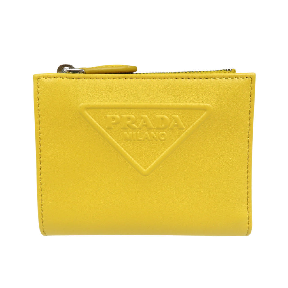 未使用 プラダ コンパクトウォレット 1ML050 レザー シルバー金具 イエロー 二つ折り財布 0473【中古】PRADA