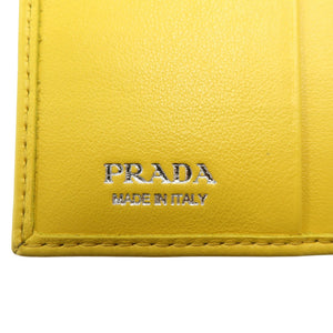 未使用 プラダ コンパクトウォレット 1ML050 レザー シルバー金具 イエロー 二つ折り財布 0473【中古】PRADA