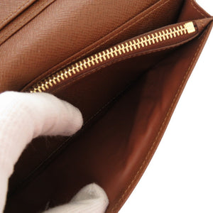 新品同様 ルイ ヴィトン ポルトフォイユ ブラザ モノグラム M66540 ブラウン 長財布 LV 1070【中古】LOUIS VUITTON メンズ