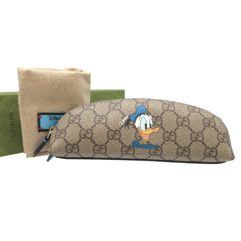 未使用 グッチ ドナルドダック 662129 GGスプリーム レザー ベージュ ブルー 青 筆箱 ペンケース 1850【中古】GUCCI