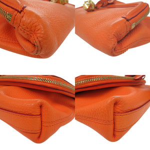 美品 アレキサンダーマックイーン スカル 装飾 クラッチバッグ ゴールド金具 レザー オレンジ 0029【中古】Alexander McQueen