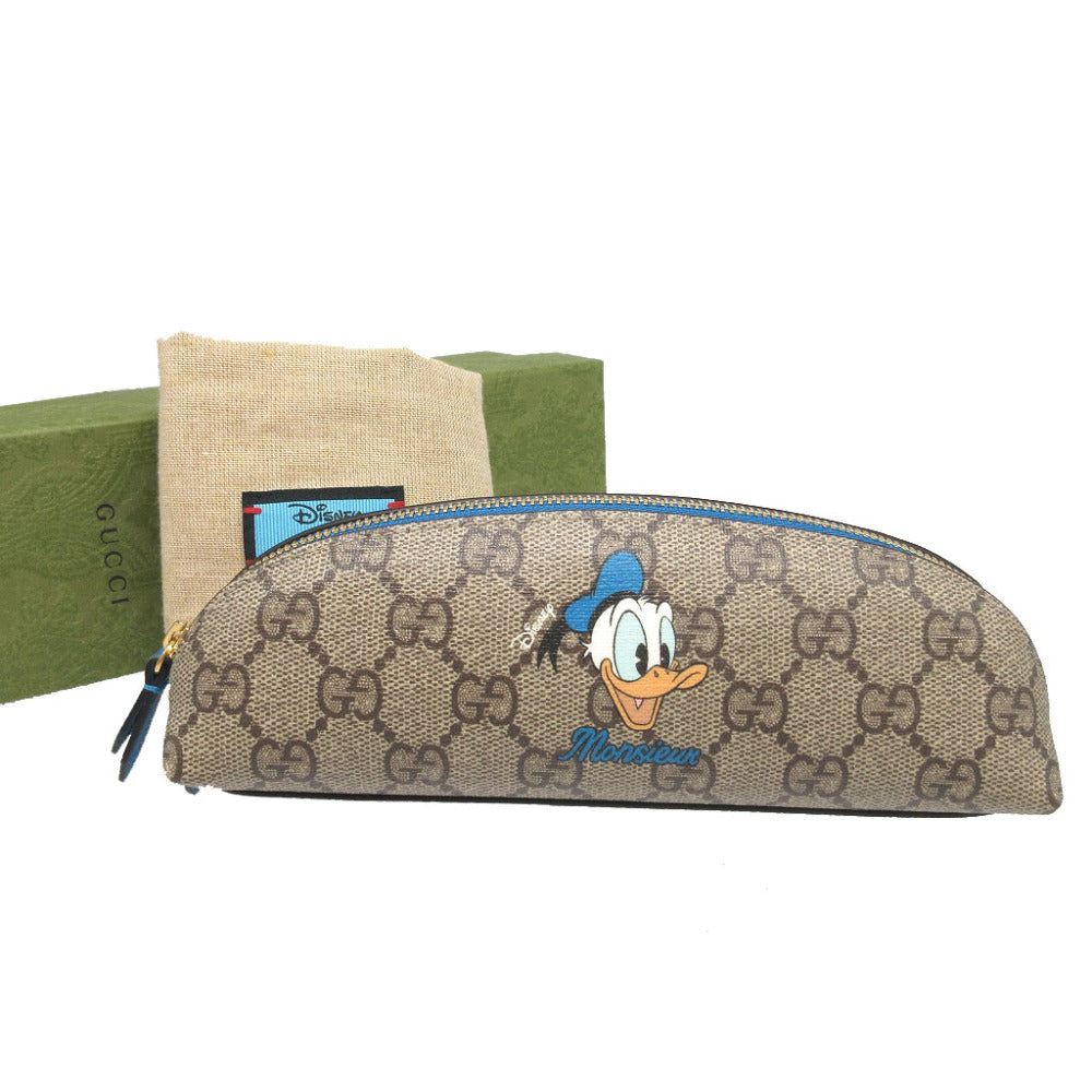 未使用 グッチ 662129 ディズニーコラボ ドナルドダック GGスプリーム レザー ベージュ ブルー 青 筆箱 ペンケース 0199【中古】GUCCI