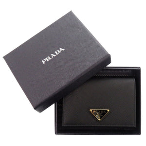 新品同様 プラダ 1MV021 サフィアーノレザー ブラック 二つ折り財布 黒 0741【中古】PRADA
