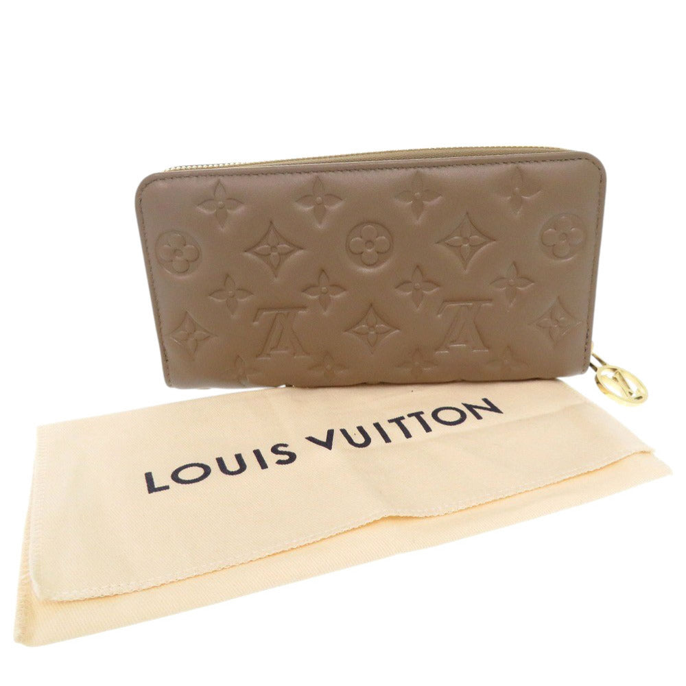 新品同様 ルイ ヴィトン ジッピーウォレット クッサン モノグラムエンボス M81511 トープ ラウンドファスナー 長財布 LV 0986【中古】LOUIS VUITTON