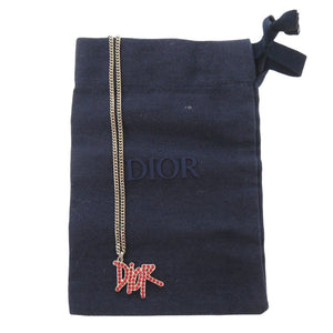 美品 クリスチャンディオール × ショーン ステューシー ロゴ N1386HOMMT メタル ストーン レッド シルバー ネックレス 1446【中古】Christian Dior