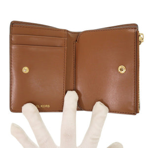 新品同様 マイケルコース EMPIRE エンパイア シグネチャーロゴ スナップ コイン ビルフォールド ミディアム コーティングキャンバス ブラウン 二つ折り財布 0592【中古】Michael Kors