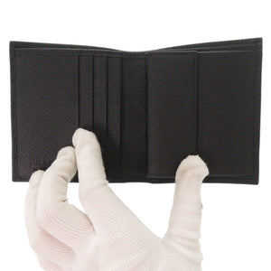 未使用品 プラダ トライアングルロゴ サフィアーノレザー ブラック 二つ折り財布 黒 0476【中古】PRADA メンズ