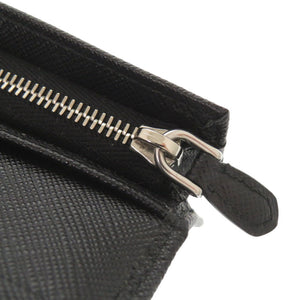 未使用品 プラダ トライアングルロゴ サフィアーノレザー ブラック 二つ折り財布 黒 1484【中古】PRADA