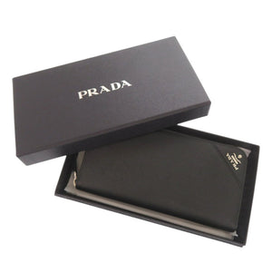新品同様 プラダ サフィアーノレザー ブラック ラウンドファスナー 長財布 黒 1506【中古】PRADA メンズ