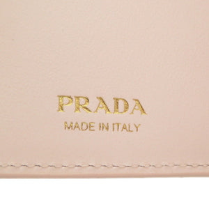 新品同様 プラダ 花柄 レザー 花柄 アイボリー ゴールド金具 1MV025 長財布 0215 【中古】 PRADA