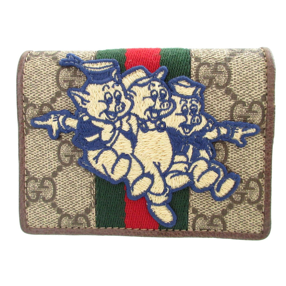 新品同様 グッチ ディズニーコラボ 三匹の子豚 557801 GGスプリーム レザー ベージュ ブラウン 茶 2つ折り財布 財布 0436【中古】GUCCI