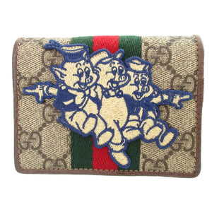 新品同様 グッチ ディズニーコラボ 三匹の子豚 557801 GGスプリーム レザー ベージュ ブラウン 茶 2つ折り財布 財布 0436【中古】GUCCI