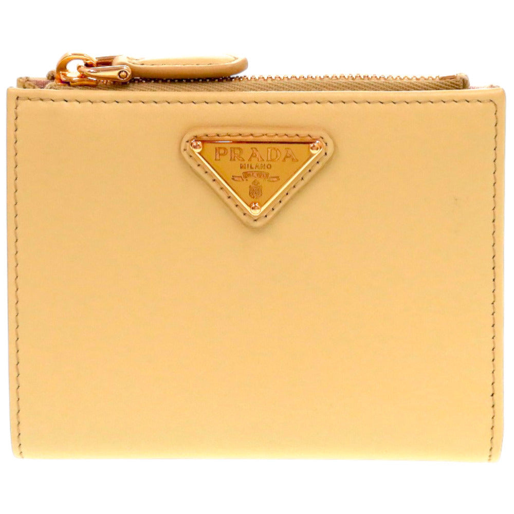 未使用品 プラダ サフィアーノトライアングル 1ML050 QHH_F0032 牛革 バニラ 黄 二つ折り財布 0961【中古】PRADA