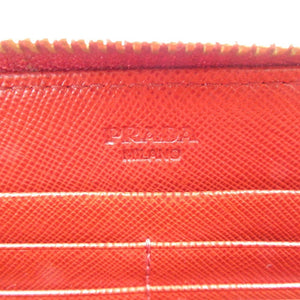 新品同様 プラダ リボン 1M0506 サフィアーノレザー ゴールド金具 レッド ラウンドファスナー 長財布 1480【中古】PRADA