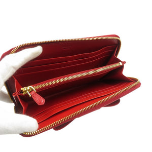 新品同様 プラダ リボン 1M0506 サフィアーノレザー ゴールド金具 レッド ラウンドファスナー 長財布 1480【中古】PRADA