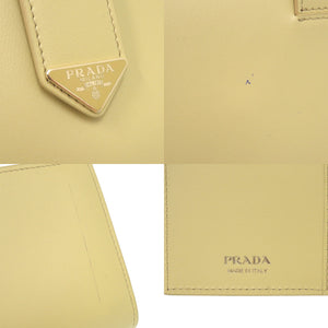 美品 プラダ 1MV025 トライアングルロゴ レザー イエロー 長財布 0615【中古】PRADA