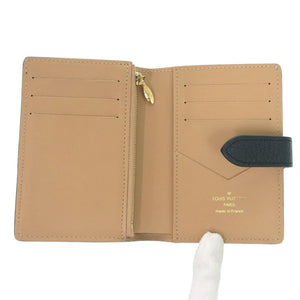 新品同様 ルイ ヴィトン カプシーヌ コンパクト ヴェルティカル M81561 トリヨンレザー ブラック 二つ折り財布 黒 LV 0522【中古】LOUIS VUITTON