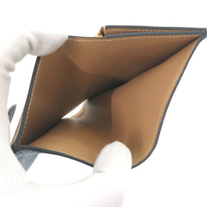 新品同様 ルイ ヴィトン カプシーヌ コンパクト ヴェルティカル M81561 トリヨンレザー ブラック 二つ折り財布 黒 LV 0522【中古】LOUIS VUITTON