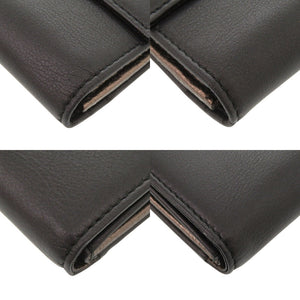 新品同様 サルヴァトーレフェラガモ レザー ブラック 長財布 三つ折り財布 黒 1059【中古】Salvatore Ferragamo