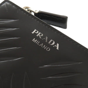 美品 プラダ ロゴ コンパクトウォレット ブラッシュドレザー ブラック 二つ折り財布 黒 0352【中古】PRADA