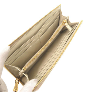 新品同様 ミュウミュウ 5M1183 型押しレザー アイボリー L字ファスナー 長財布 0486【中古】MIUMIU