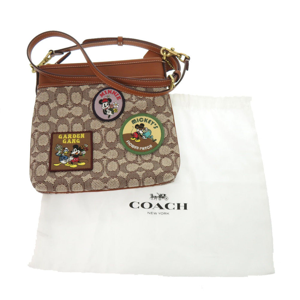 新品同様 コーチ CH491 ディズニー ロゴパッチ ミッキー キャンバス レザー ブラウン ショルダーバッグ 0668【中古】COACH