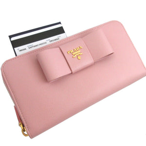 新品同様 プラダ 1M0506 リボン サフィアーノレザー ピンク ラウンドファスナー長財布 財布 0951【中古】PRADA