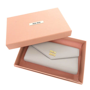 新品同様 ミュウミュウ ヴィッテロダイノレザー 5MH024 レザー グレー系 長財布 三つ折り長財布 0952【中古】MIUMIU