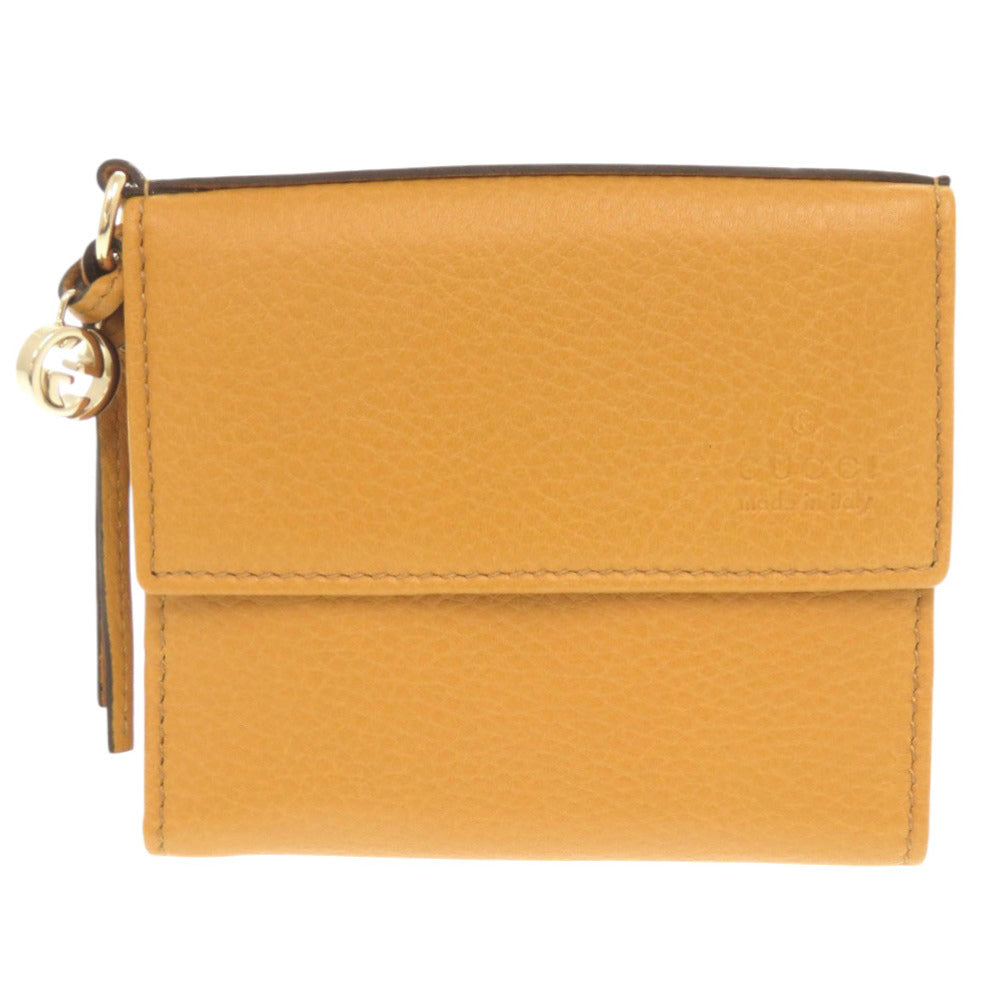 新品同様 グッチ 323399 レザー イエロー 二つ折り財布 黄 1552【中古】GUCCI