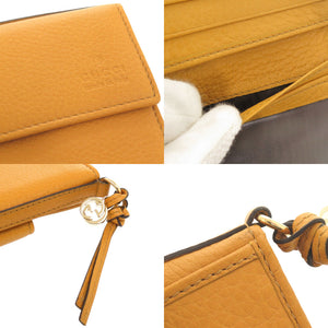 新品同様 グッチ 323399 レザー イエロー 二つ折り財布 黄 1552【中古】GUCCI