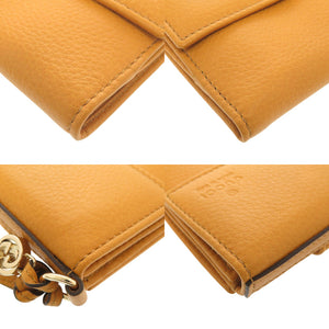 新品同様 グッチ 323399 レザー イエロー 二つ折り財布 黄 1552【中古】GUCCI