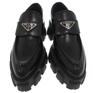 未使用品 プラダ モノリス ポインテッドトゥ ローファー 三角ロゴ トライアングルロゴ 1D663M レザーシューズ レザー NERO 1585【中古】PRADA