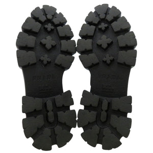 未使用品 プラダ モノリス ポインテッドトゥ ローファー 三角ロゴ トライアングルロゴ 1D663M レザーシューズ レザー NERO 1585【中古】PRADA