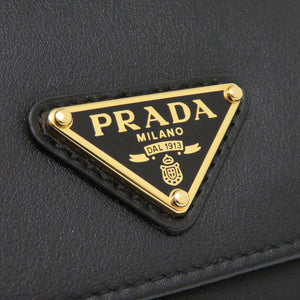 未使用 プラダ サフィアーノトライアングル 1MH043 レザー ブラック 三つ折り財布 黒 1105【中古】PRADA