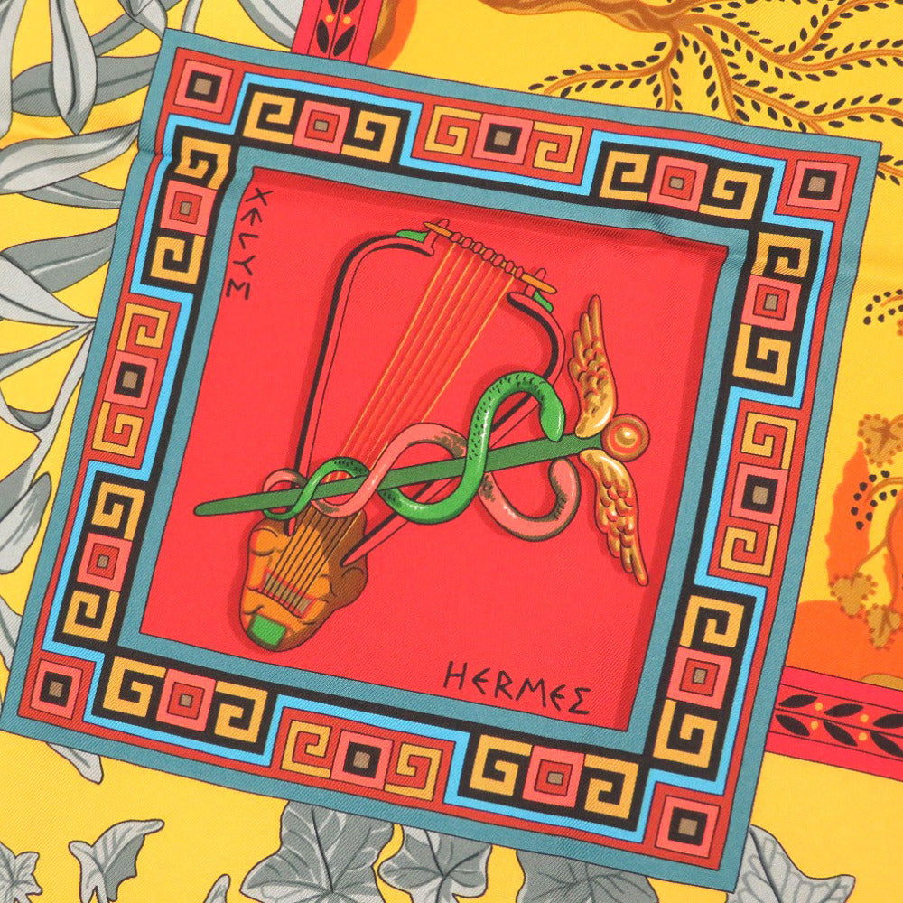 新品同様 エルメス カレ90 神々の音楽 ケンタウロス 楽器 シルク オレンジ スカーフ 0308 【中古】 HERMES