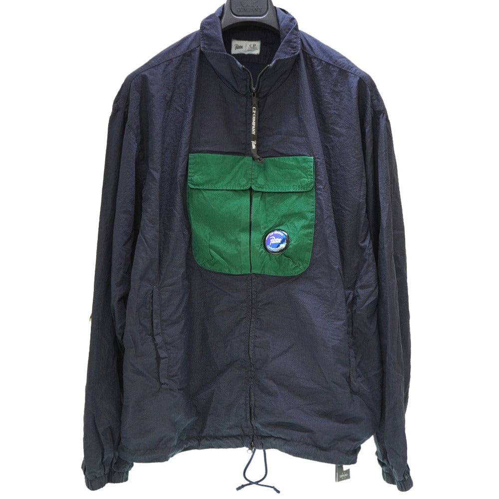 未使用 CPカンパニー × PATTA パタ トラック ナイロン ジャケット ネイビー/グリーン サイズL 紺緑 0155【中古】C.P.COMPANY メンズ
