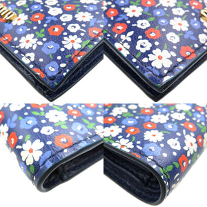新品同様 ミュウミュウ 花柄 レザー ゴールド金具 ブルー マルチ 二つ折り財布 0011【中古】miumiu