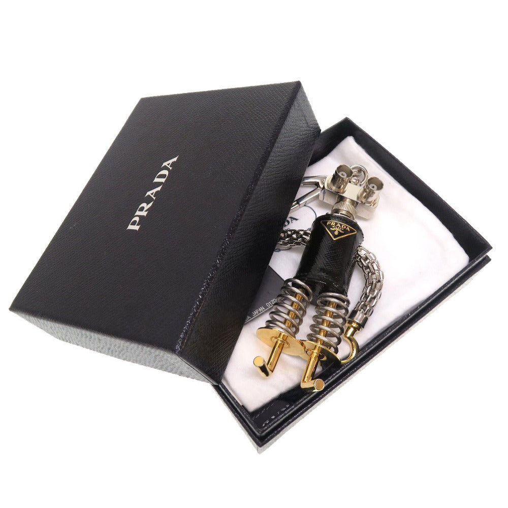 新品同様 プラダ トリック ロボット 1TR250 レザー メタル ブラック シルバー ゴールド バッグチャーム キーホルダー 0165 【中古】 PRADA