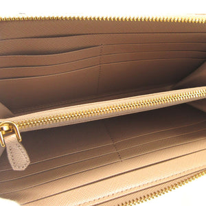 新品同様 プラダ 三角プレート サフィアーノレザー ピンクベージュ ラウンドファスナー長財布 財布 0177【中古】PRADA