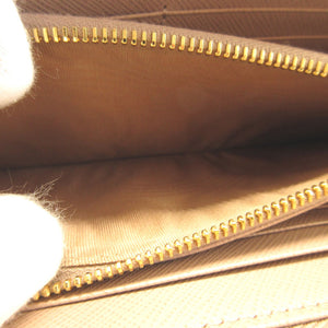 新品同様 プラダ 三角プレート サフィアーノレザー ピンクベージュ ラウンドファスナー長財布 財布 0177【中古】PRADA