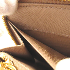 新品同様 プラダ 三角プレート サフィアーノレザー ピンクベージュ ラウンドファスナー長財布 財布 0177【中古】PRADA